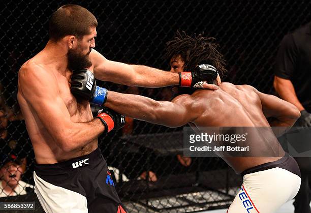 Dominique Steele punches Court McGee in their welterweight bout during the UFC Fight Night event at Vivint Smart Home Arena on August 6, 2016 in Salt...