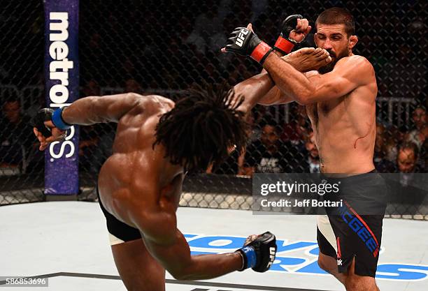 Dominique Steele kicks Court McGee in their welterweight bout during the UFC Fight Night event at Vivint Smart Home Arena on August 6, 2016 in Salt...