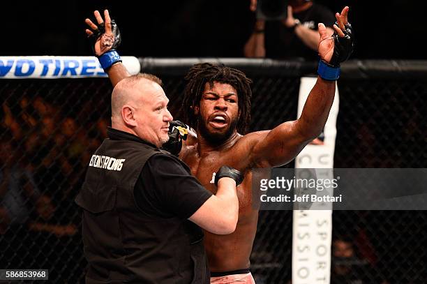 Dominique Steele raises his hands after facing Court McGee in their welterweight bout during the UFC Fight Night event at Vivint Smart Home Arena on...