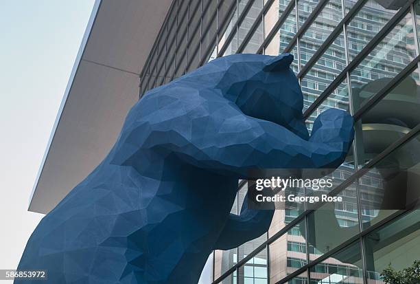 Giant 40-foot blue bear peers into the window of the Convention Center on July 29 in Denver, Colorado. Denver, the State Capitol, and the nearby...