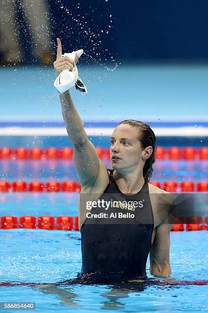 Katinka Hosszu of Hungary celebrates winning gold and a new world record in the Final of the Women's 400m Individual Medley on Day 1 of the Rio 2016...