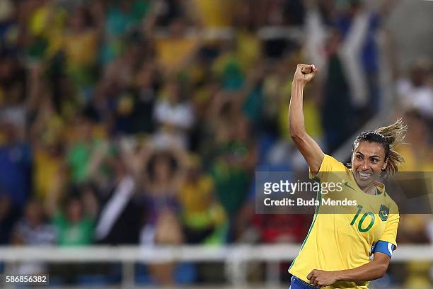 Marta of Brazil celebrates after scoring Brazil's fourth goal during the Women's Group E first round match between Brazil and Sweden on Day 1 of the...