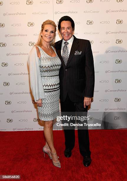 Kathleen McCrone and entertainer Wayne Newton arrive at Caesars Palace during the resort's 50th anniversary gala on August 6, 2016 in Las Vegas,...