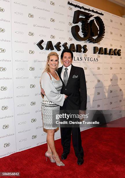 Kathleen McCrone and entertainer Wayne Newton arrive at Caesars Palace during the resort's 50th anniversary gala on August 6, 2016 in Las Vegas,...