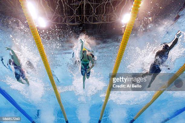 Sandrine Mainville of Canada, Emma McKeon of Australia and Simone Manuel of the United States compete in the Final of the Women's 4 x 100m Freestyle...