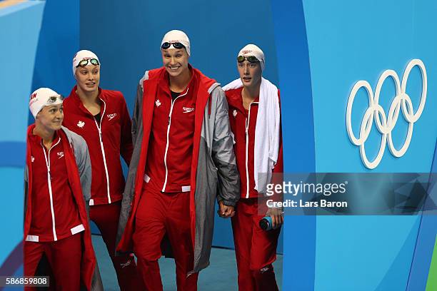 Sandrine Mainville, Chantal Van Landeghem, Taylor Ruck and Penny Oleksak of Canada prepare for the Final of the Women's 4 x 100m Freestyle Relay on...