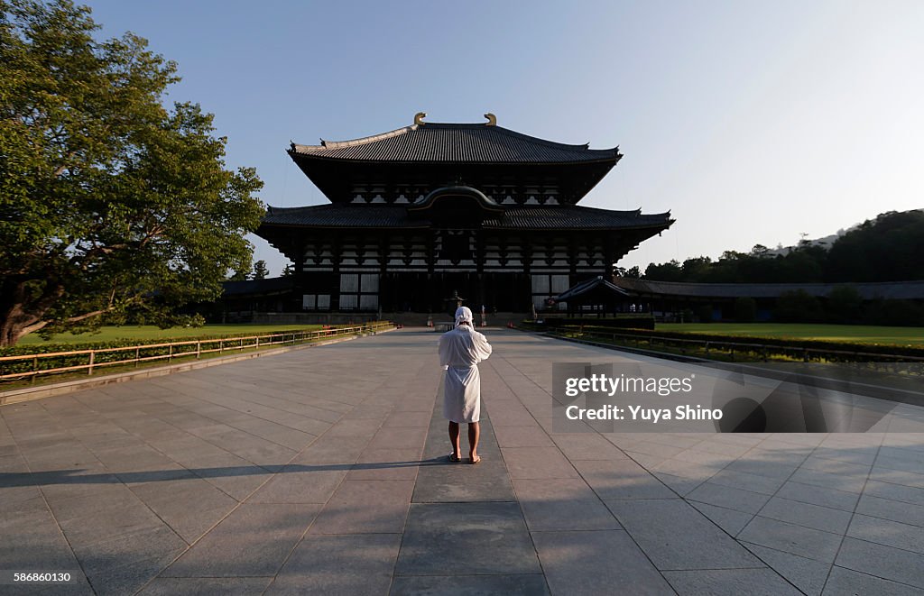 Monks Clean The Great Buddha of Nara  Ahead Of Bon Festival