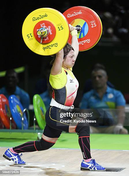 Japanese weightlifter Hiromi Miyake competes in the women's 48-kilogram event at the Rio de Janeiro Olympics on Aug. 6, 2016. Miyake, who lifted a...