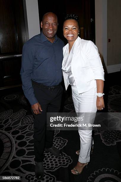Filmmaker John Singleton and actress Akosua Busia attend the 32nd annual Television Critics Association Awards during the 2016 Television Critics...