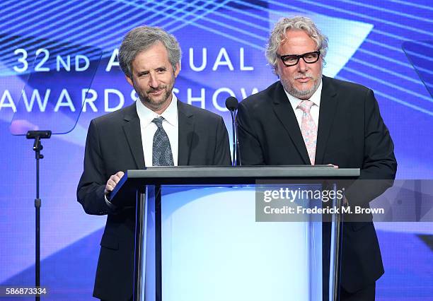 Series creators Scott Alexander and Larry Karaszewski accept the award for 'Outstanding Achievement in Movies, Miniseries and Specials' for "The...