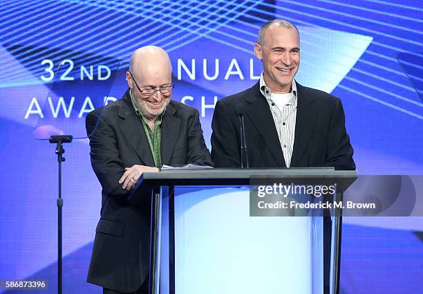 Series creator Joe Weisberg and executive producer Joel Fields accept the award for 'Outstanding Achievement in Drama' for "The Americans" onstage at...