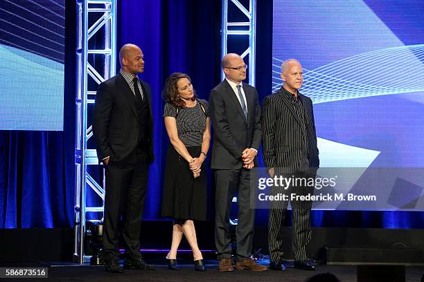 Executive producers Anthony Hemingway, Nina Jacobson, Brad Simpson and Ryan Murphy accept the award for 'Outstanding Achievement in Movies,...