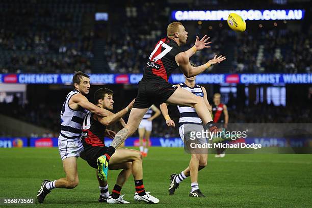 Adam Cooney of the Bombers marks the ball during the round 20 AFL match between the Geelong Cats and the Essendon Bombers at Etihad Stadium on August...