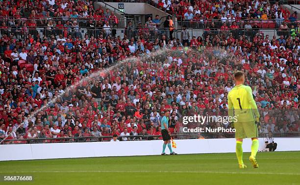Spray was turned on during the game during International Championships Cup match between Liverpool FC and FC Barcelona played Wembley Stadium London...