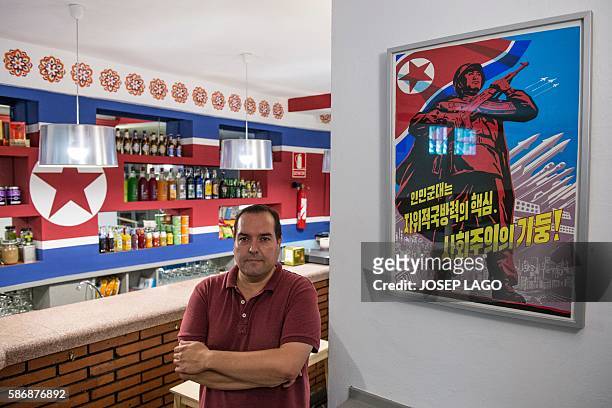Daniel BOSQUE - Special delegate for North Korea's Committee for Cultural Relations with Foreign Countries, Alejandro Cao de Benos poses in his bar...