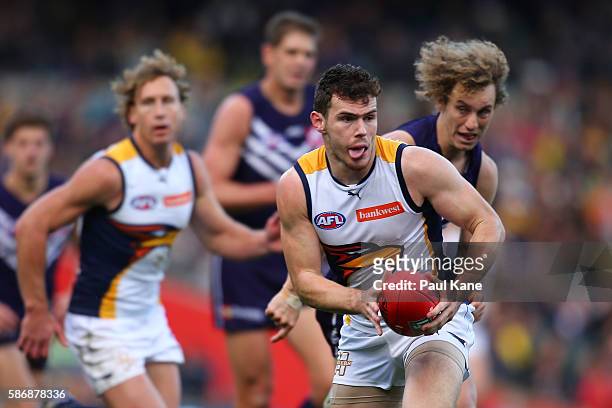 Luke Shuey of the Eagles looks to pass the ball during the round 20 AFL match between the Fremantle Dockers and the West Coast Eagles at Domain...