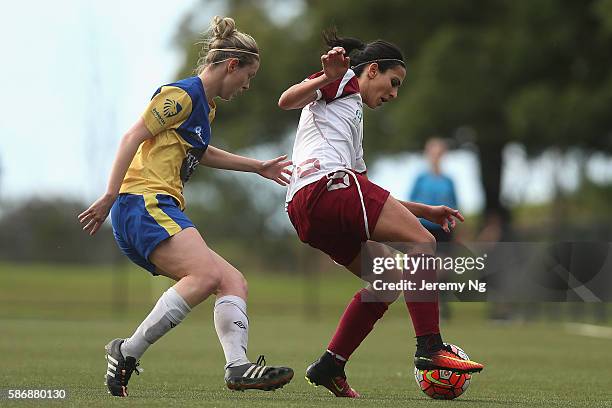 Leena Khamis of the Rams and Elizabeth O'Reilly of Sydney University SFC compete for the ball during the Round 18 NPL Women's match between Sydney...