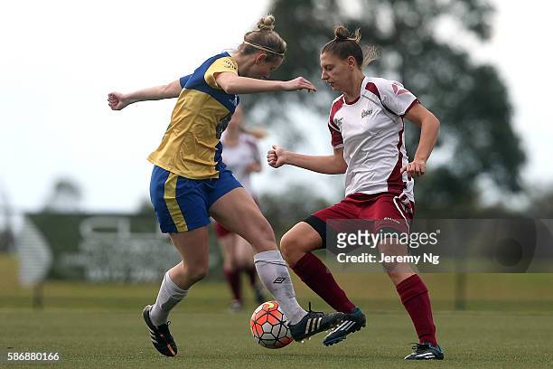 Stefani Skerlevska of the Rams and Elizabeth O'Reilly of Sydney University SFC compete for the ball during the Round 18 NPL Women's match between...