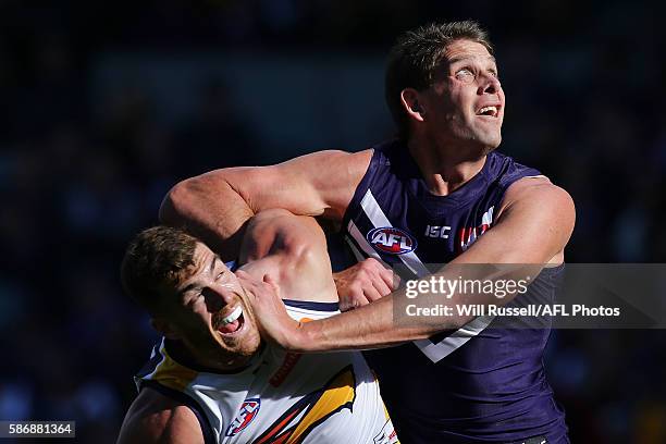 Aaron Sandilands of the Dockers contests a ruck with Scott Lycett of the Eagles during the round 20 AFL match between the Fremantle Dockers and the...