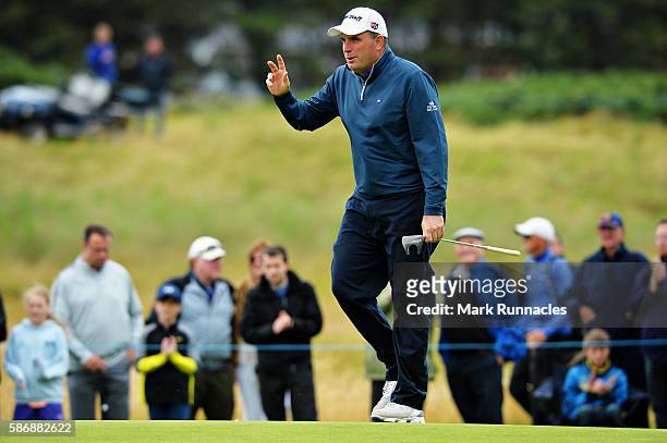 Anthony Wall of England reacts to the crowds applause after putting on hole 6 on day four of the Aberdeen Asset Management Paul Lawrie Matchplay at...