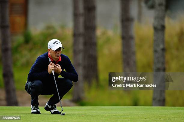 Alex Noren of Sweden lines up a putt on the green on hole 4 on day four of the Aberdeen Asset Management Paul Lawrie Matchplay at Archerfield Links...