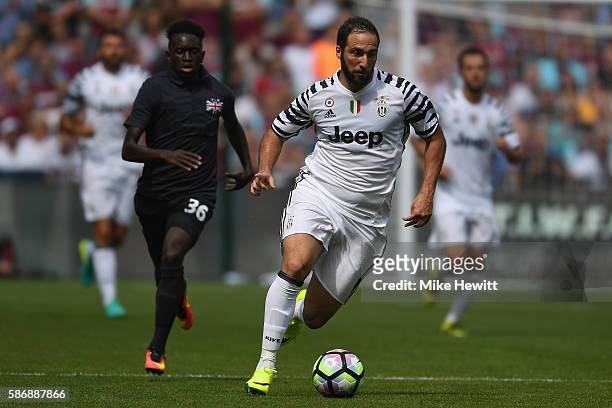 Gonzalo Higuain of Juventus in action during the Pre-Season Friendly between West Ham United and Juventus at London Stadium on August 7, 2016 in...