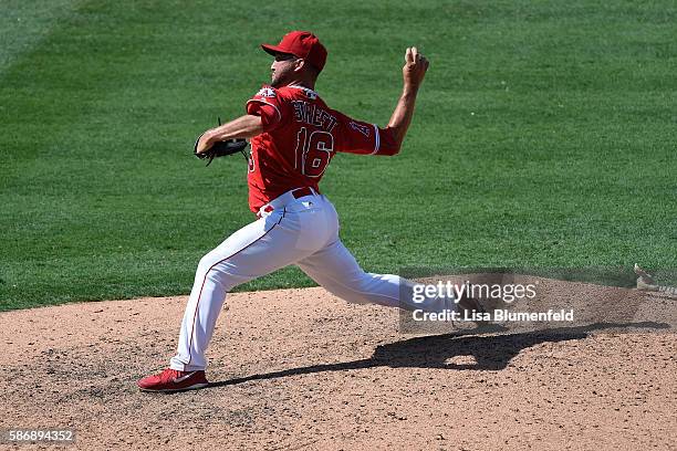 Huston Street of the Los Angeles Angels of Anaheim pitches in the ninth inning against the Boston Red Sox at Angel Stadium of Anaheim on July 31,...