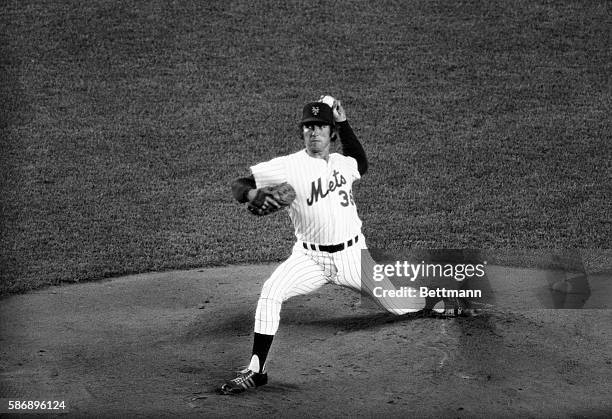 Jerry Koosman, who rode the New York Mets' roller coaster from a 20-victory season last year to a 20-loss record this season, pitches to the Pirates....