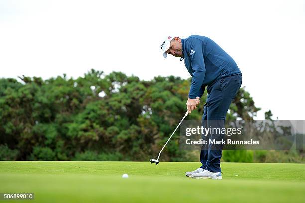 Anthony Wall of England putting on the green on hole 18 on day four of the Aberdeen Asset Management Paul Lawrie Matchplay at Archerfield Links Golf...