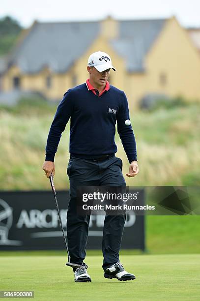 Alex Noren of Sweden flicks his ball on the green on hole 17 on day four of the Aberdeen Asset Management Paul Lawrie Matchplay at Archerfield Links...
