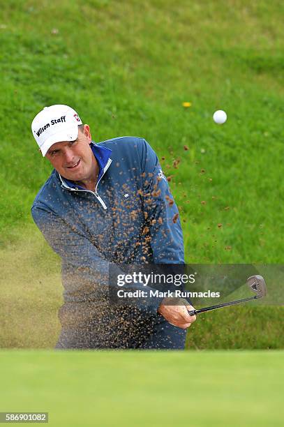 Anthony Wall of England takes a bunker shot on hole 16 on day four of the Aberdeen Asset Management Paul Lawrie Matchplay at Archerfield Links Golf...