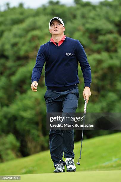 Alex Noren of Sweden looks to the sky after missing a putt on the green on hole 16 on day four of the Aberdeen Asset Management Paul Lawrie Matchplay...