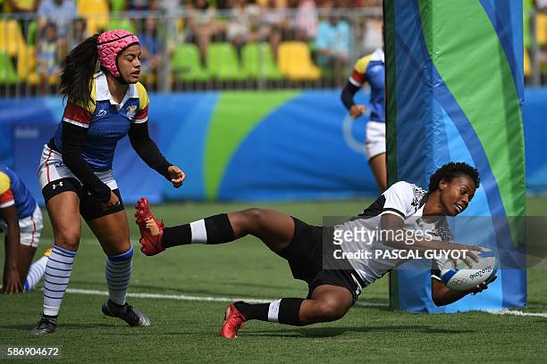 Fiji's Raijieli Daveua scores a try in the womens rugby sevens match between Colombia and Fiji during the Rio 2016 Olympic Games at Deodoro Stadium...