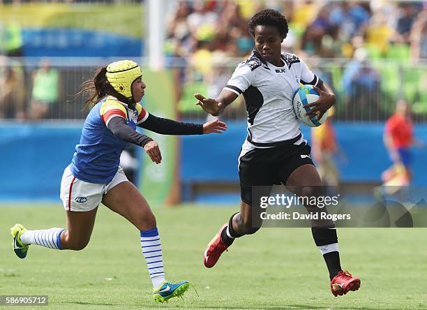 Raijieli Daveua of Fiji carries the ball against Colombia during the Women's Pool A rugby match on Day 2 of the Rio 2016 Olympic Games at Deodoro...