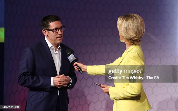 Jacqui Oatley on stage with Chief executive Officer of McDonalds, Paul Pomroy at the McDonalds Community Awards at Wembley Stadium on August 7, 2016...