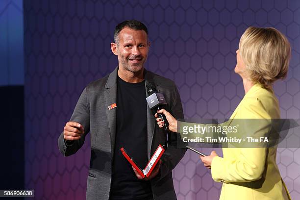 Jacqui Oatley on stage with Ryan Giggs at the McDonalds Community Awards at Wembley Stadium on August 7, 2016 in London, England. The McDonalds...