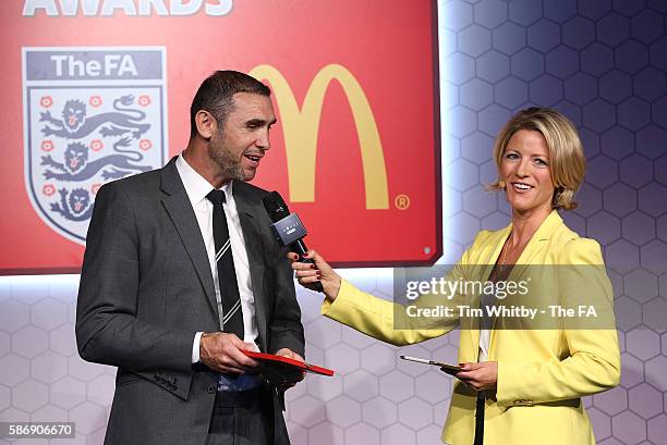 Jacqui Oatley on stage with Martin Keown at the McDonalds Community Awards at Wembley Stadium on August 7, 2016 in London, England. The McDonalds...