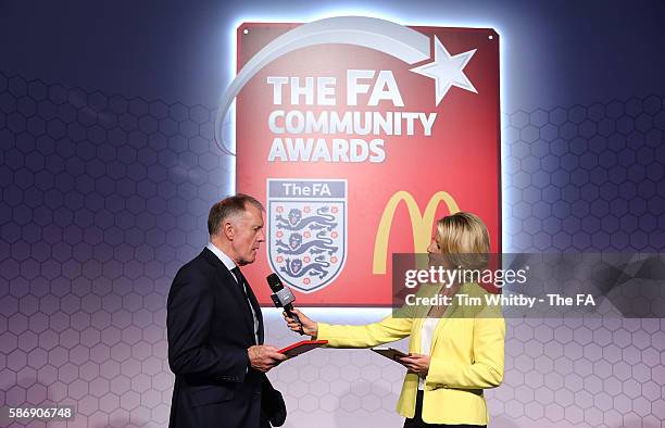 Jacqui Oatley on stage with Sir Geoff Hurst at the McDonalds Community Awards at Wembley Stadium on August 7, 2016 in London, England. The McDonalds...