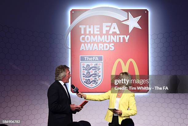 Jacqui Oatley on stage with Pat Jennings at the McDonalds Community Awards at Wembley Stadium on August 7, 2016 in London, England. The McDonalds...