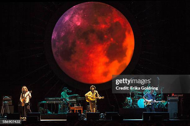 Carl Broemel, Bo Koster, Ray LaMontagne, Patrick Hallahan and Tom Blankenship perform during the Ouroboros Tour at FirstMerit Bank Pavilion at...