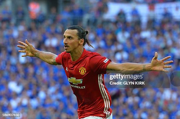 Manchester United's Swedish striker Zlatan Ibrahimovic celebrates scoring their second goal during the FA Community Shield football match between...