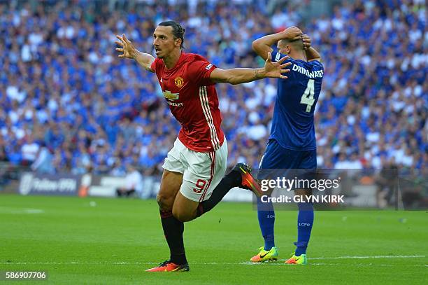 Manchester United's Swedish striker Zlatan Ibrahimovic celebrates scoring their second goal during the FA Community Shield football match between...