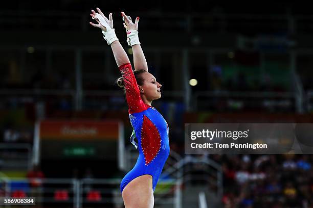 Daria Spiridonova of Russia reacts after competing on the uneven bars during Women's qualification for Artistic Gymnastics on Day 2 of the Rio 2016...