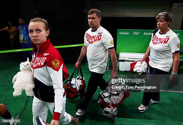 Daria Spiridonova of Russia and staffs move during Women's qualification for Artistic Gymnastics on Day 2 of the Rio 2016 Olympic Games at the Rio...