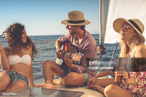 friends summer vacation: on a sailing yacht - italy beer stock pictures, royalty-free photos & images