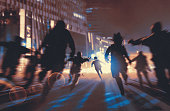 man running away from zombies in the night city