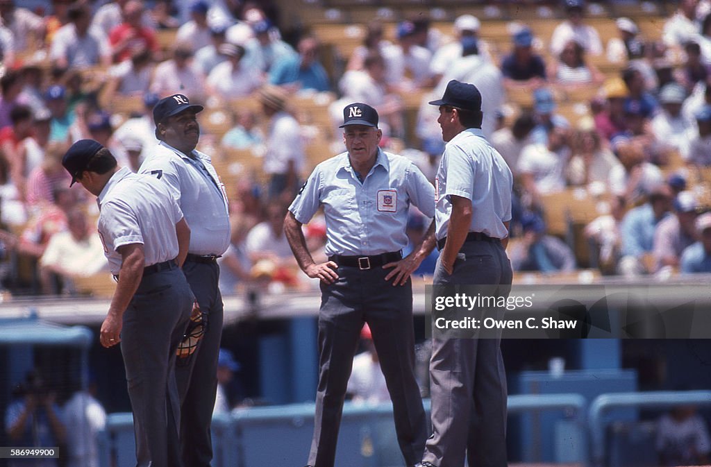 Eric Gregg circa 1986 and his crew prepares to umpire a game for the