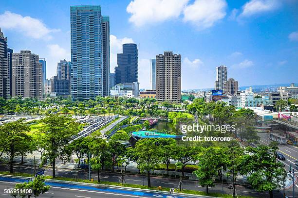 taichung (台中) city skyline at maple garden (秋紅谷景觀生態公園) area in taichung (台中) taiwan (台湾) - 台湾 stock pictures, royalty-free photos & images