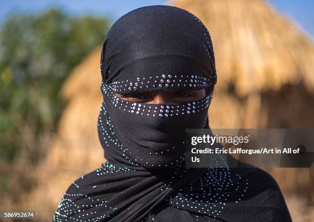 Portrait of an oromo woman with face covered, amhara region, artuma, Ethiopia on February 21, 2016 in Artuma, Ethiopia.