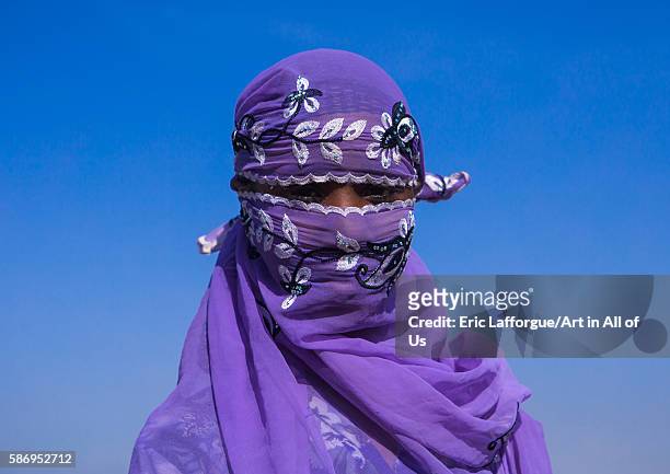 Portrait of an oromo woman in blue veil, amhara region, artuma, Ethiopia on February 21, 2016 in Artuma, Ethiopia.